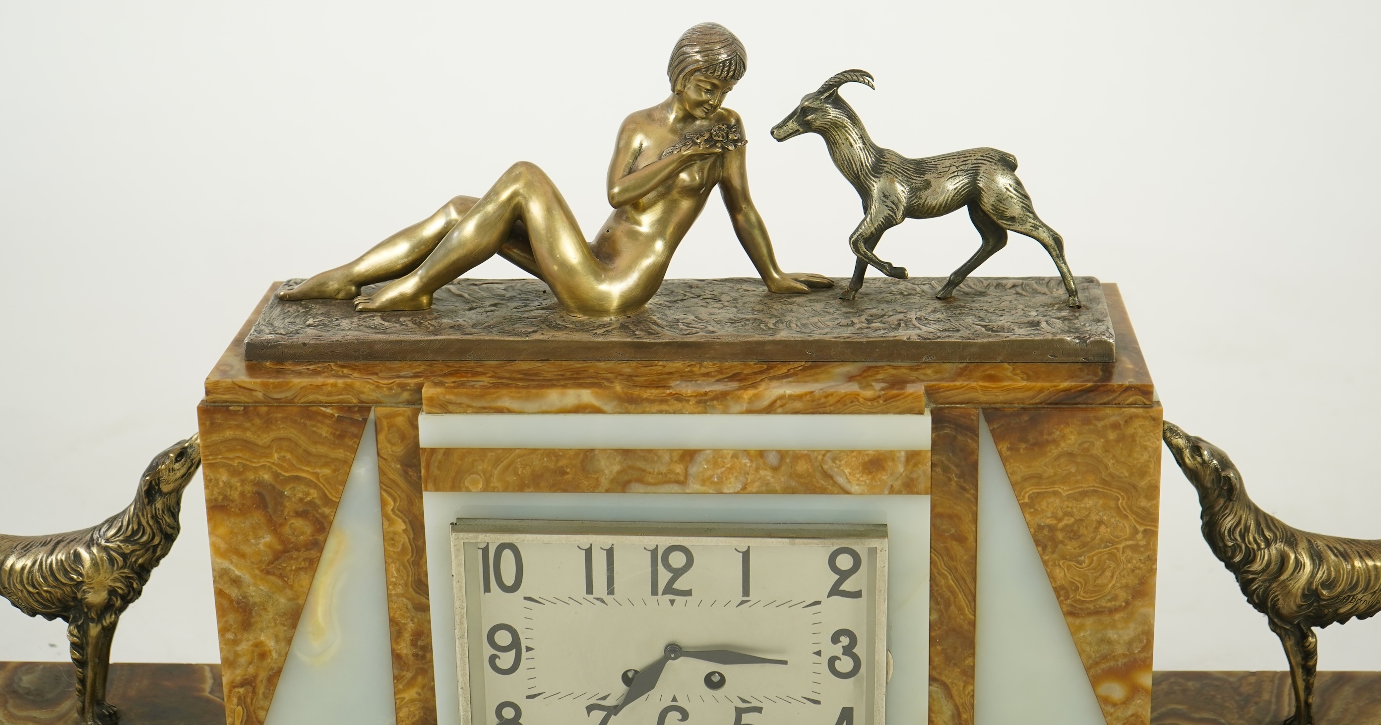 F.H. Danvin (French, 20th century), a marble and onyx clock